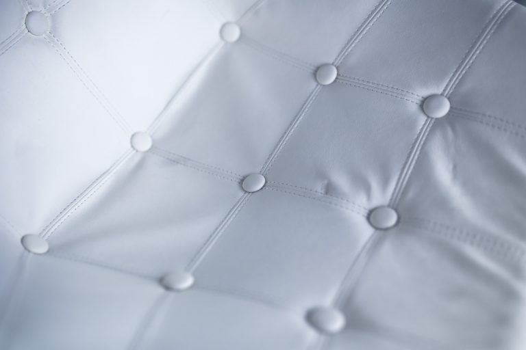 Close up of white leather upholstery