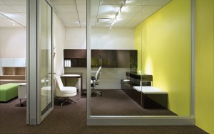 Empty office with a yellow accent wall