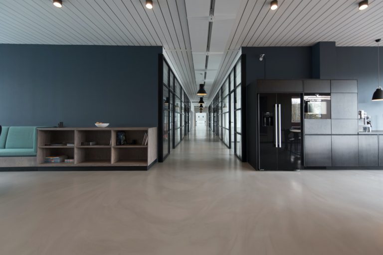 A modern and sleek office with dark walls